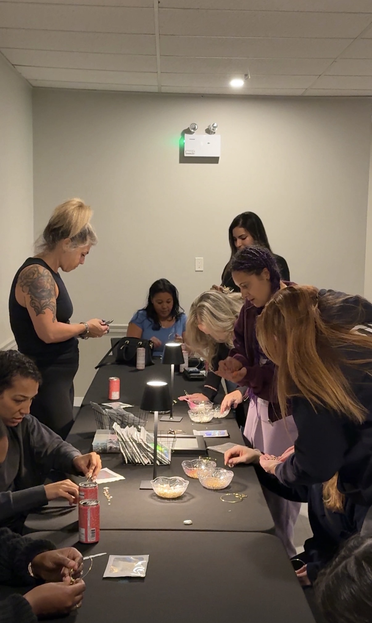 Guests making bracelets together at Mocktails and Movement